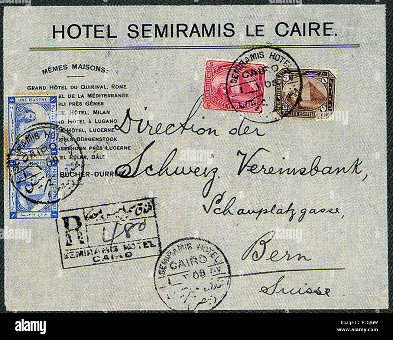 N/A. Français : Imprimé de l'hotel Sémiramis, Le Caire. Envoi enregistré vers la Suisse. Timbres Egypte 1 piastre paire (1884), 1 m & 5 m (1888). Lot 2571 vendu 700 FS en 2000 (collection Cihangir). 1 May 1908 (scan 2017-09-29). Post of Egypt 32 1908 1pi 1m&amp;5m Egypt Semiramis Hotel Cairo Bern G54-58-63 Stock Photo