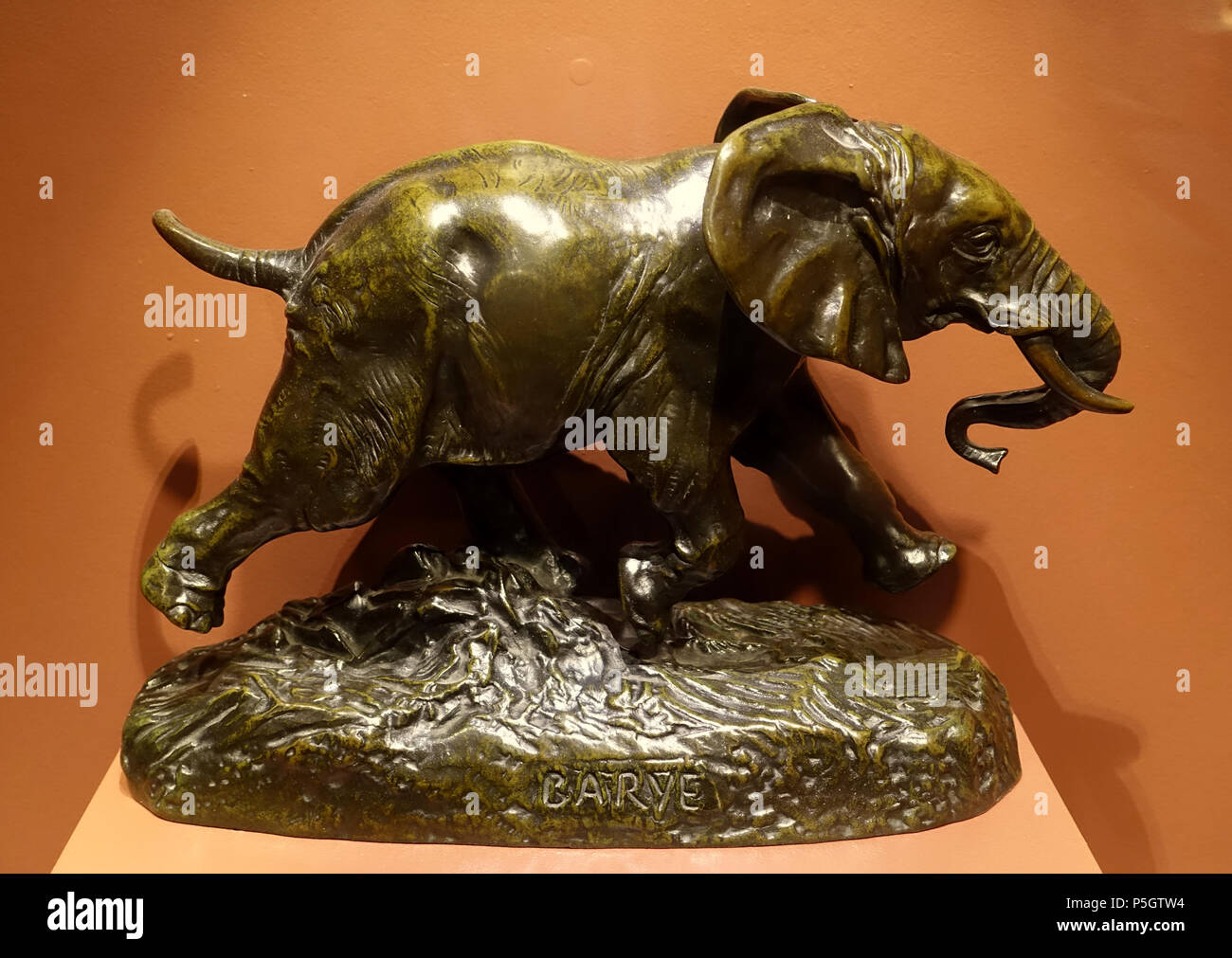 N/A. English: Exhibit in the Middlebury College Museum of Art - Middlebury, Vermont, USA. 4 March 2017, 15:19:18. Daderot 65 African Elephant Running, by Antoine-Louis Barye, undated, bronze - Middlebury College Museum of Art - Middlebury, VT - DSC08144 Stock Photo