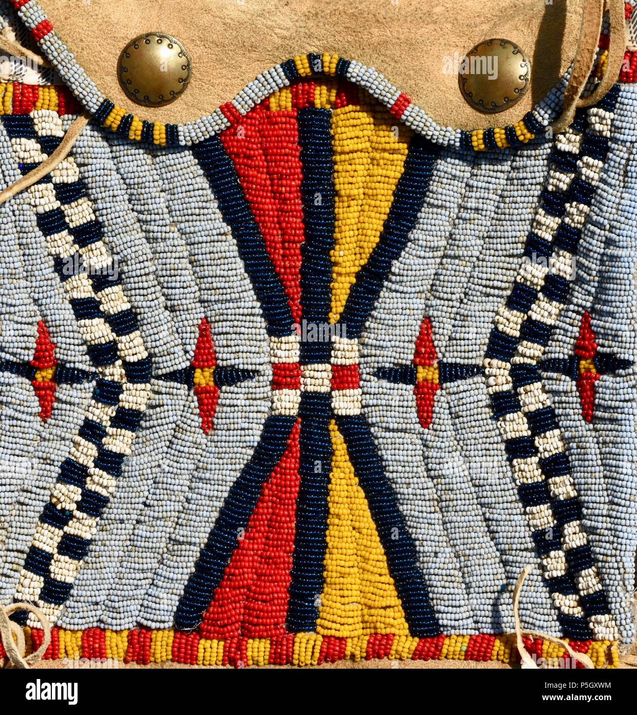 Close up of traditional Native American designed bead pattern on hand crafted pouch on display at Bloody Lake Rendezvous, Woodford, Wisconsin, USA Stock Photo