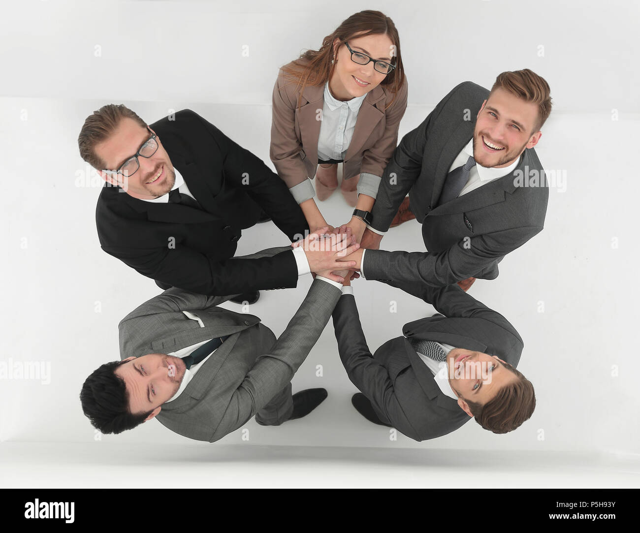 top view.the business team shows its unity Stock Photo - Alamy