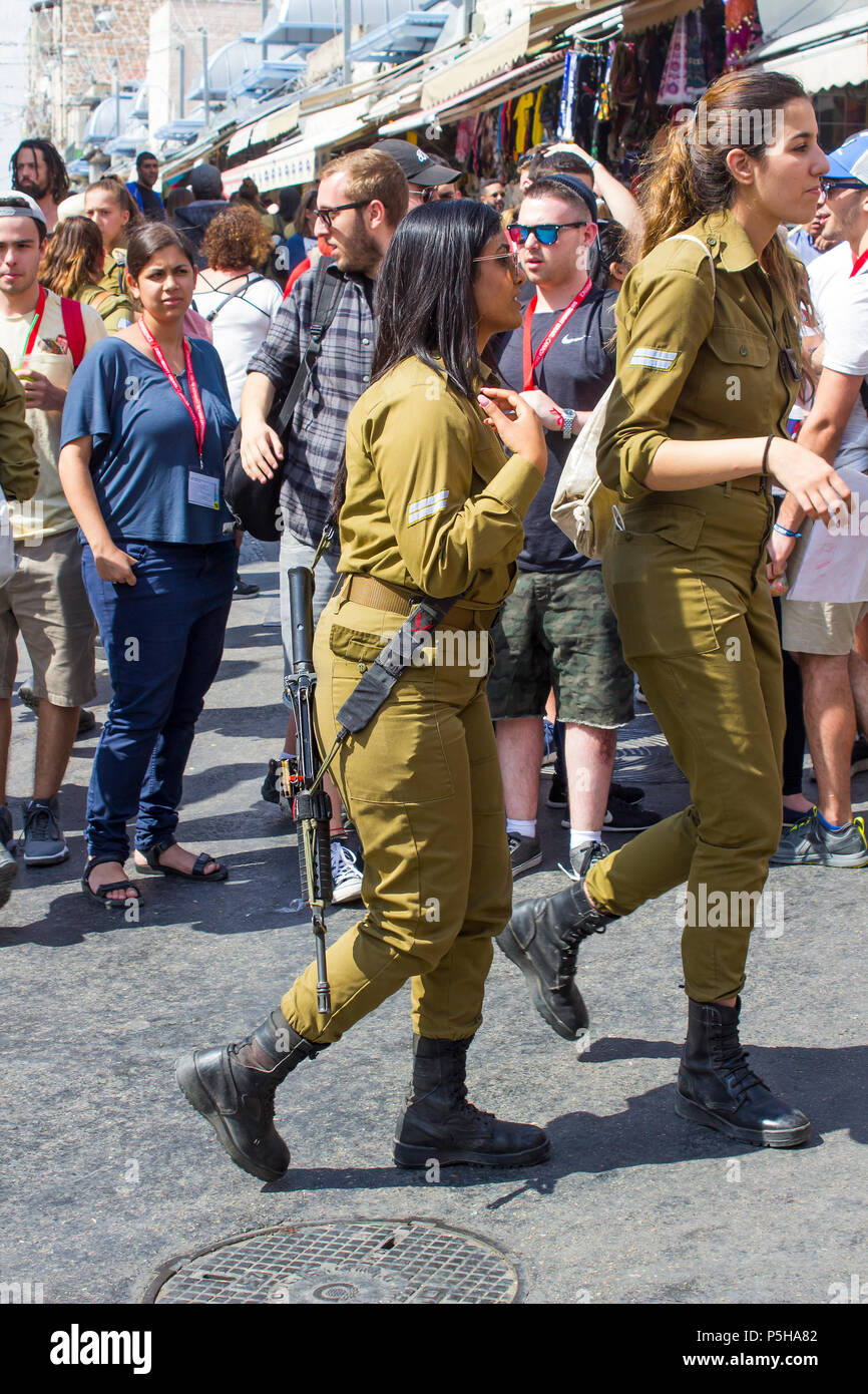 9 May 2018 Two young off duty female Israeli Army conscripts together at the Mahane Yehuda street market in Jerusalem Israel Stock Photo