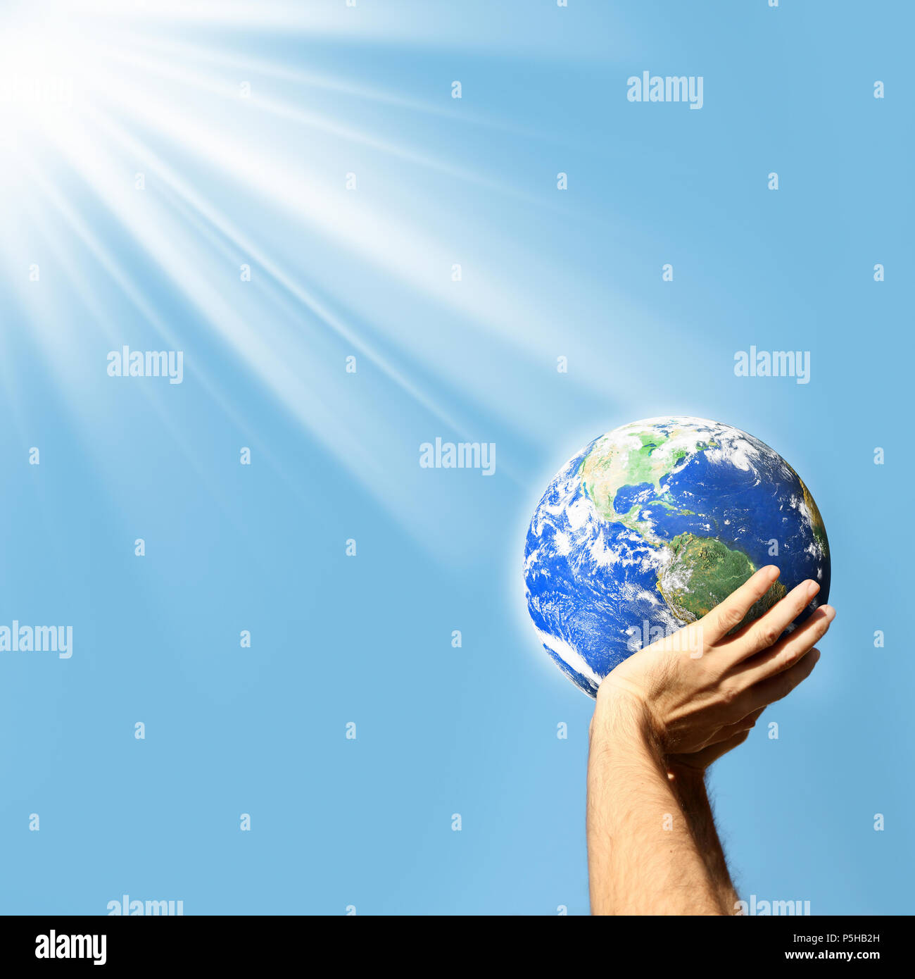 Hands holding globe hi-res stock photography and images - Alamy