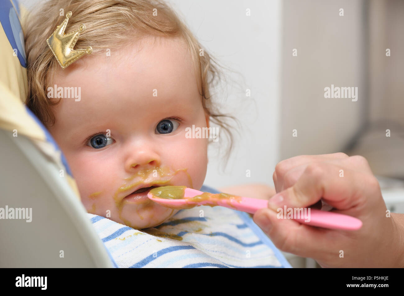 Feeding up of little cute baby girl Stock Photo