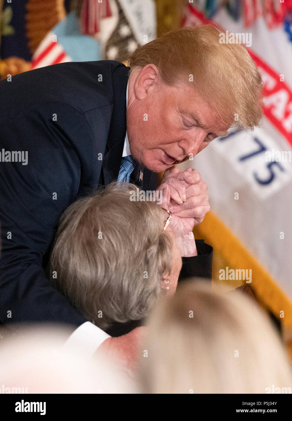 United States President Donald J. Trump and Pauline Conner, widow of then-First Lieutenant Garlin M. Conner, U.S. Army as he hosts a ceremony to posthumously award the medal to her late husband for conspicuous gallantry during World War II in the East Room of the White House in Washington, DC on Tuesday, June 26, 2018. Conner is being honored for his actions on January 24,1945, while serving as an intelligence officer with Headquarters and Headquarters Company, 3d Battalion, 7th Infantry Regiment, 3d Infantry Division. Credit: Ron Sachs/CNP /MediaPunch Stock Photo