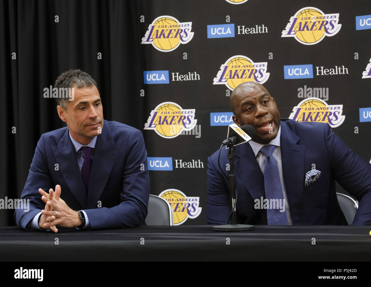 Los Angeles, California, USA. 26th June, 2018. Los Angeles Lakers president of basketball operations, Earvin ''Magic'' Johnson, right, and general manager Rob Pelinka at an introductory press conference in Los Angeles, Tuesday, June 26, 2018. The Lakers introduce two new draft players, Moritz Wagner, originally from Germany, the 25th pick in the 2018 NBA Draft and guard Sviatoslav Mykhailiuk, originally from Ukraine. Credit: Ringo Chiu/ZUMA Wire/Alamy Live News Stock Photo