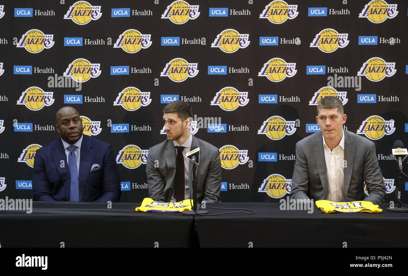 Los Angeles, California, USA. 26th June, 2018. Los Angeles Lakers president of basketball operations, Earvin ''Magic'' Johnson, left, rookies Sviatoslav Mykhailiuk, center, and Moritz Wagner at an introductory press conference in Los Angeles, Tuesday, June 26, 2018. The Lakers introduce two new draft players, Moritz Wagner, originally from Germany, the 25th pick in the 2018 NBA Draft and guard Sviatoslav Mykhailiuk, originally from Ukraine. Credit: Ringo Chiu/ZUMA Wire/Alamy Live News Stock Photo