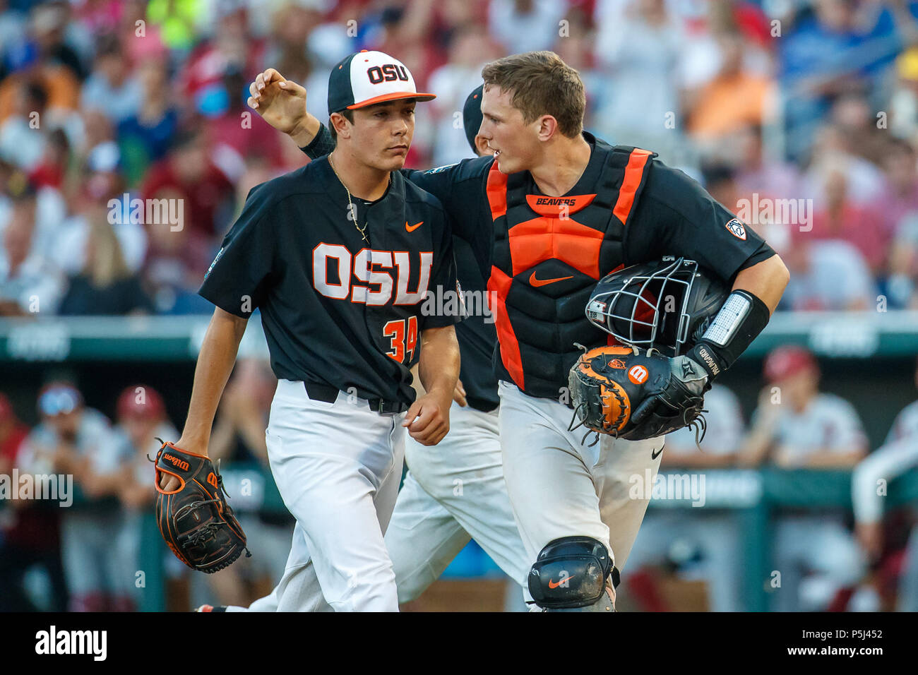 Omaha Ne U S 26th June 18 Oregon State Relief Pitcher Christian Chamberlain 34 Is Met By Teammate Catcher Adley Rutschman 35 In Action During Game 1 Of The 18 Ncaa Men S College