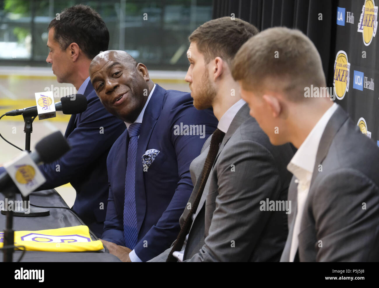 Los Angeles, California, USA. 26th June, 2018. Los Angeles Lakers president of basketball operations, Earvin ''Magic'' Johnson, general manager Rob Pelinka, rookies Moritz Wagner and Sviatoslav Mykhailiuk arrive at an introductory press conference in Los Angeles, Tuesday, June 26, 2018. The Lakers introduce two new draft players, Moritz Wagner, originally from Germany, the 25th pick in the 2018 NBA Draft and guard Sviatoslav Mykhailiuk, originally from Ukraine. Credit: Ringo Chiu/ZUMA Wire/Alamy Live News Stock Photo