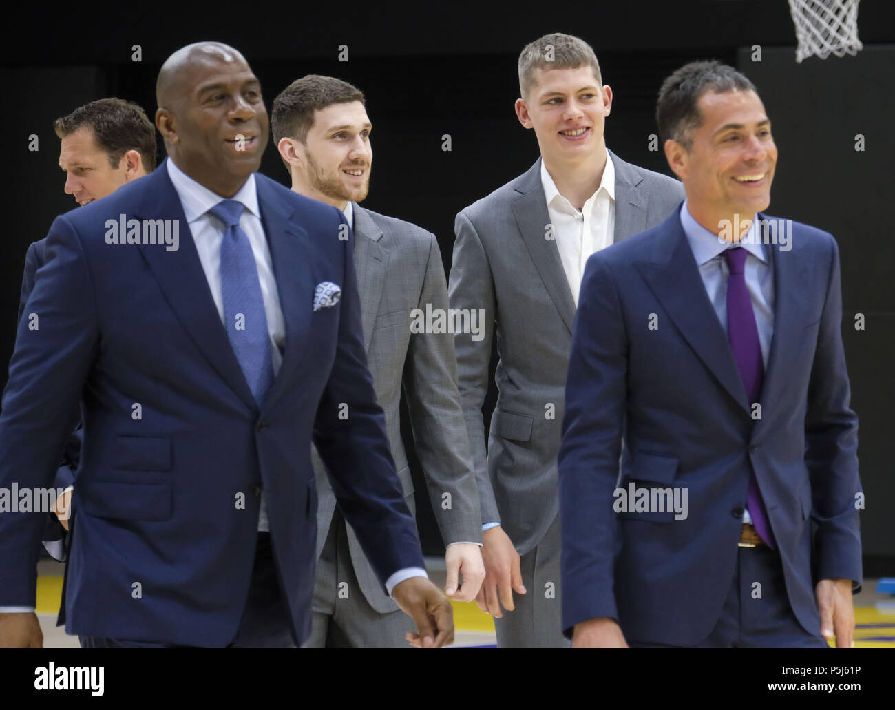 Los Angeles, California, USA. 26th June, 2018. Los Angeles Lakers president  of basketball operations, Earvin ''Magic'' Johnson, head coach Luke Walton,  general manager Rob Pelinka, rookies Moritz Wagner and Sviatoslav  Mykhailiuk arrive