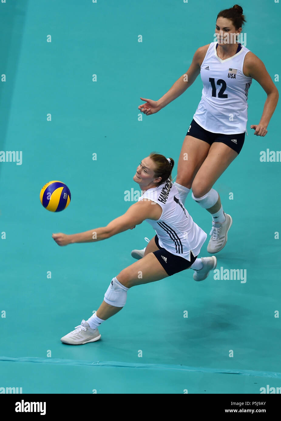 Nanjing, China's Jiangsu Province. 27th June, 2018. Micha Hancock (Front) of the United States competes during the Pool B match between the United States and Turkey at the 2018 FIVB Volleyball Nations League Women's Finals in Nanjing, capital of east China's Jiangsu Province, June 27, 2018. The United States won 3-2. Credit: Han Yuqing/Xinhua/Alamy Live News Stock Photo
