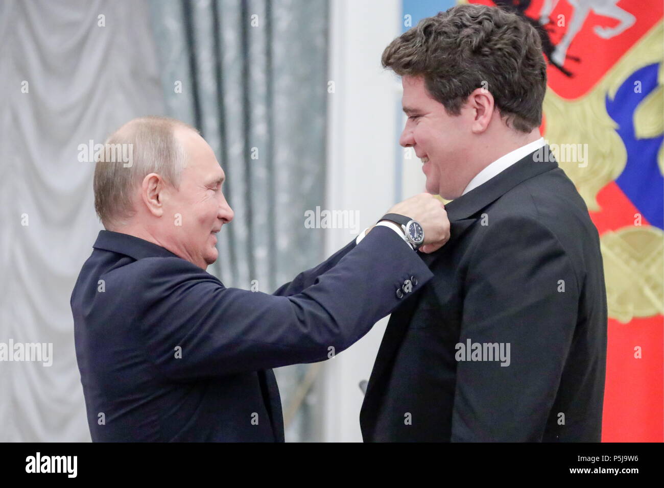 Moscow, Russia. 27th June, 2018. MOSCOW, RUSSIA - JUNE 27, 2018: Russia's President Vladimir Putin (L) awards Russian pianist Denis Matsuev with an Order of Honour at a ceremony to present state decorations at the Moscow Kremlin. Mikhail Metzel/TASS Credit: ITAR-TASS News Agency/Alamy Live News Stock Photo