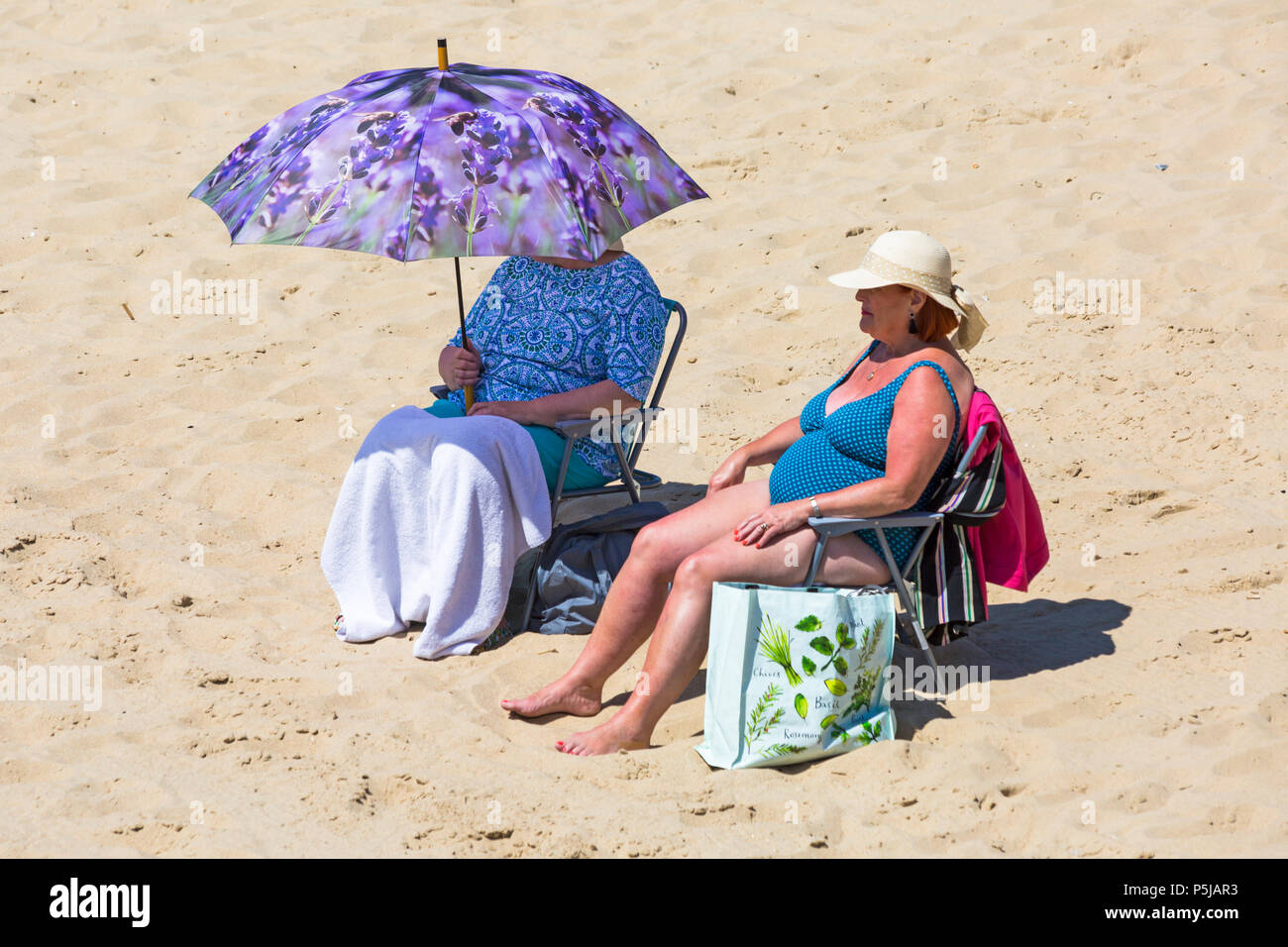 Mature woman swimming costume hi-res stock photography and images - Alamy