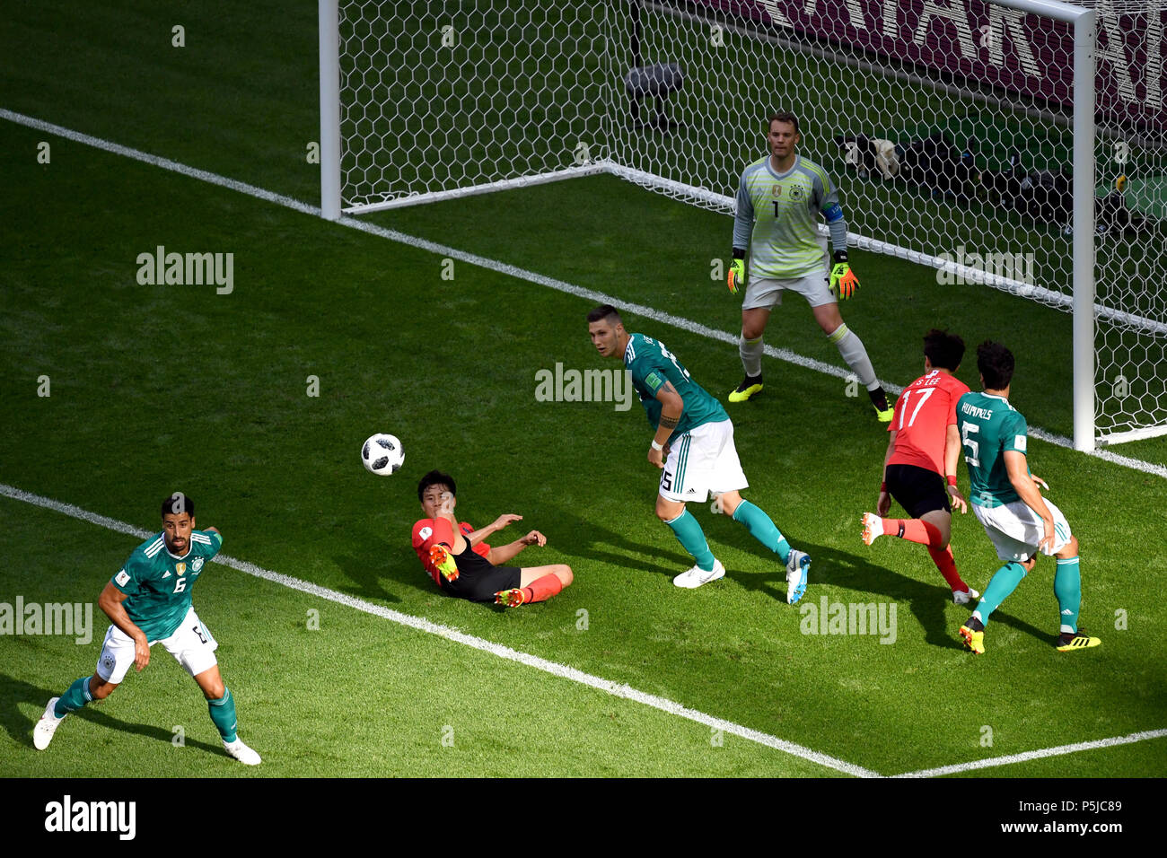 Kazan, Russia. 27th June, 2018. Soccer, FIFA World Cup, group F preliminary, Germany vs South Korea at the Kazan-Arena. Germany's keeper Manuel Neuer (top) is in the goal, watching Germany's Niklas Suele (c) defend. Credit: Ina Fassbender/dpa/Alamy Live News Stock Photo
