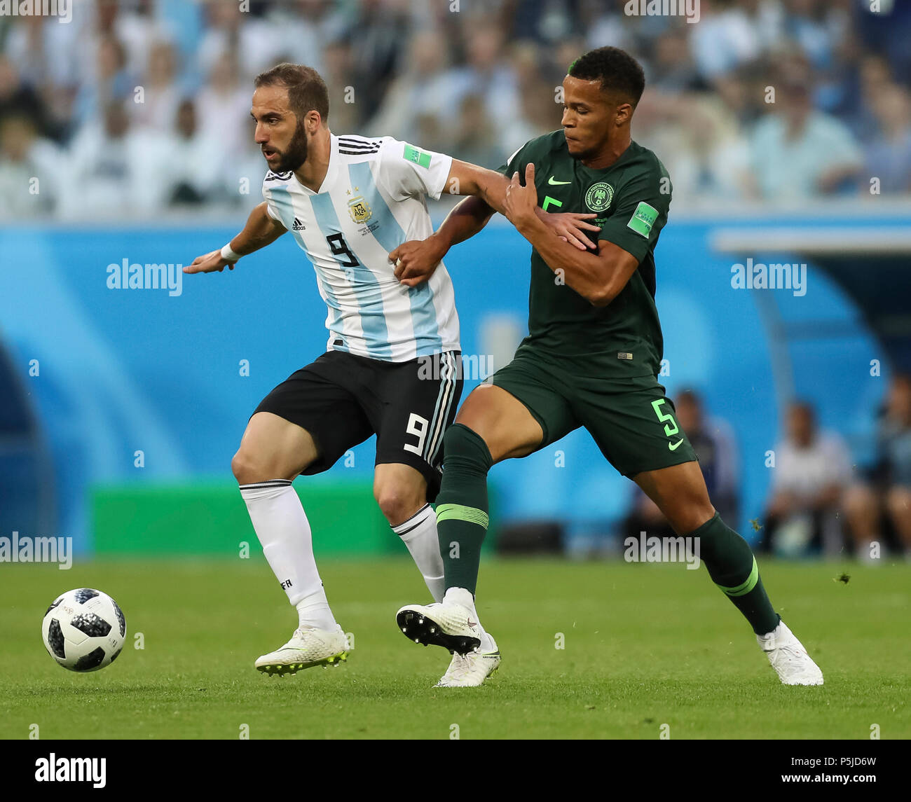 St Petersburg, Russia, 27 June 2018. Gonzalo Higuain of Argentina and William Troost-Ekong of Nigeria during the 2018 FIFA World Cup Group D match between Nigeria and Argentina at Saint Petersburg Stadium on June 26th 2018 in Saint Petersburg, Russia. (Photo by Daniel Chesterton/phcimages.com) Credit: PHC Images/Alamy Live News Stock Photo