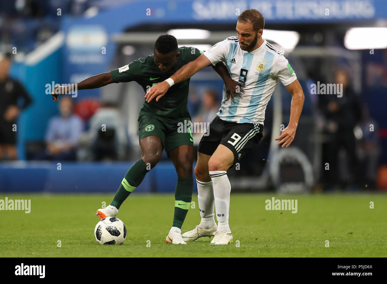St Petersburg, Russia, 27 June 2018. Oghenekaro Etebo of Nigeria and Gonzalo Higuain of Argentina during the 2018 FIFA World Cup Group D match between Nigeria and Argentina at Saint Petersburg Stadium on June 26th 2018 in Saint Petersburg, Russia. (Photo by Daniel Chesterton/phcimages.com) Credit: PHC Images/Alamy Live News Stock Photo
