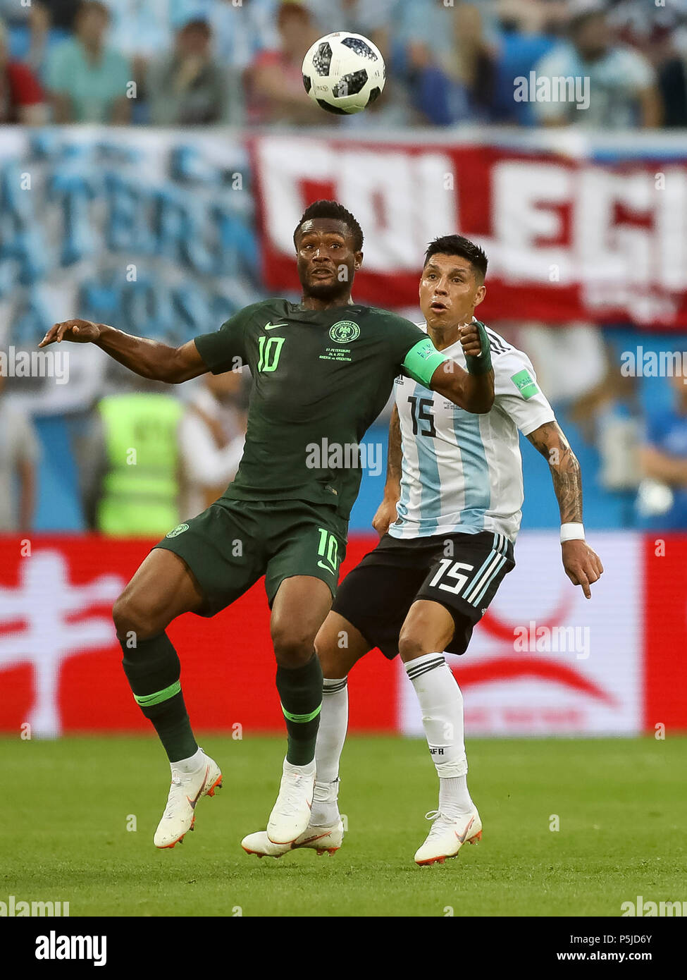 St Petersburg, Russia, 27 June 2018. Mikel John Obi of Nigeria and Enzo Perez of Argentina during the 2018 FIFA World Cup Group D match between Nigeria and Argentina at Saint Petersburg Stadium on June 26th 2018 in Saint Petersburg, Russia. (Photo by Daniel Chesterton/phcimages.com) Credit: PHC Images/Alamy Live News Stock Photo