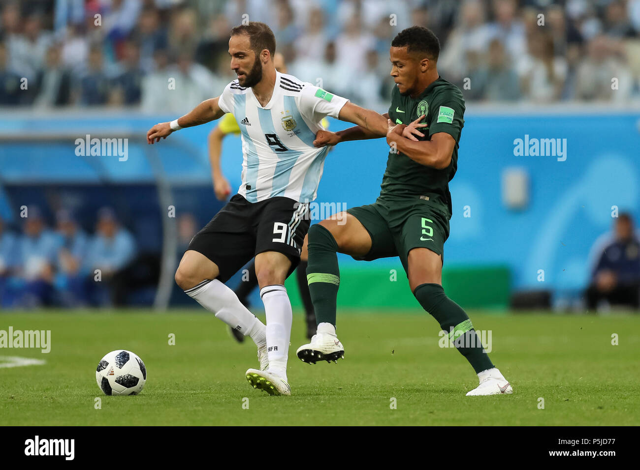 St Petersburg, Russia, 27 June 2018. Gonzalo Higuain of Argentina and William Troost-Ekong of Nigeria during the 2018 FIFA World Cup Group D match between Nigeria and Argentina at Saint Petersburg Stadium on June 26th 2018 in Saint Petersburg, Russia. (Photo by Daniel Chesterton/phcimages.com) Credit: PHC Images/Alamy Live News Stock Photo
