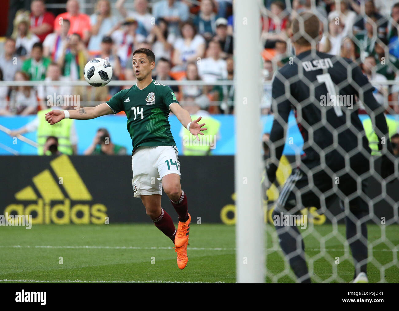 Yekaterinburg, Russia. 27th June, 2018. Javier Hernandez (L) of Mexico controls the ball during the 2018 FIFA World Cup Group F match between Mexico and Sweden in Yekaterinburg, Russia, June 27, 2018. Sweden won 3-0. Mexico and Sweden advanced to the round of 16. Credit: Li Ming/Xinhua/Alamy Live News Stock Photo