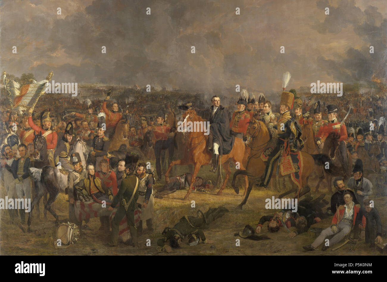 The Battle of Waterloo . The Battle of Waterloo, 18 June 1815. View of the battle field on the moment that the British commander Wellington receives the message that help from Prussian troops is underway. Bottom left the wounded Prince of Orange is being carried away. The commanders and other officers are depicted in the center on horseback. Bottom right a number of wounded and dead soldiers. In the background the battle is raging. The people portrayed include Lord Uxbridge, Sir Rowland Hill, Staff Colonel Sir William Delancey, Major-General George Cooke, Colonel Harvey, Colonel Campbell, lieu Stock Photo