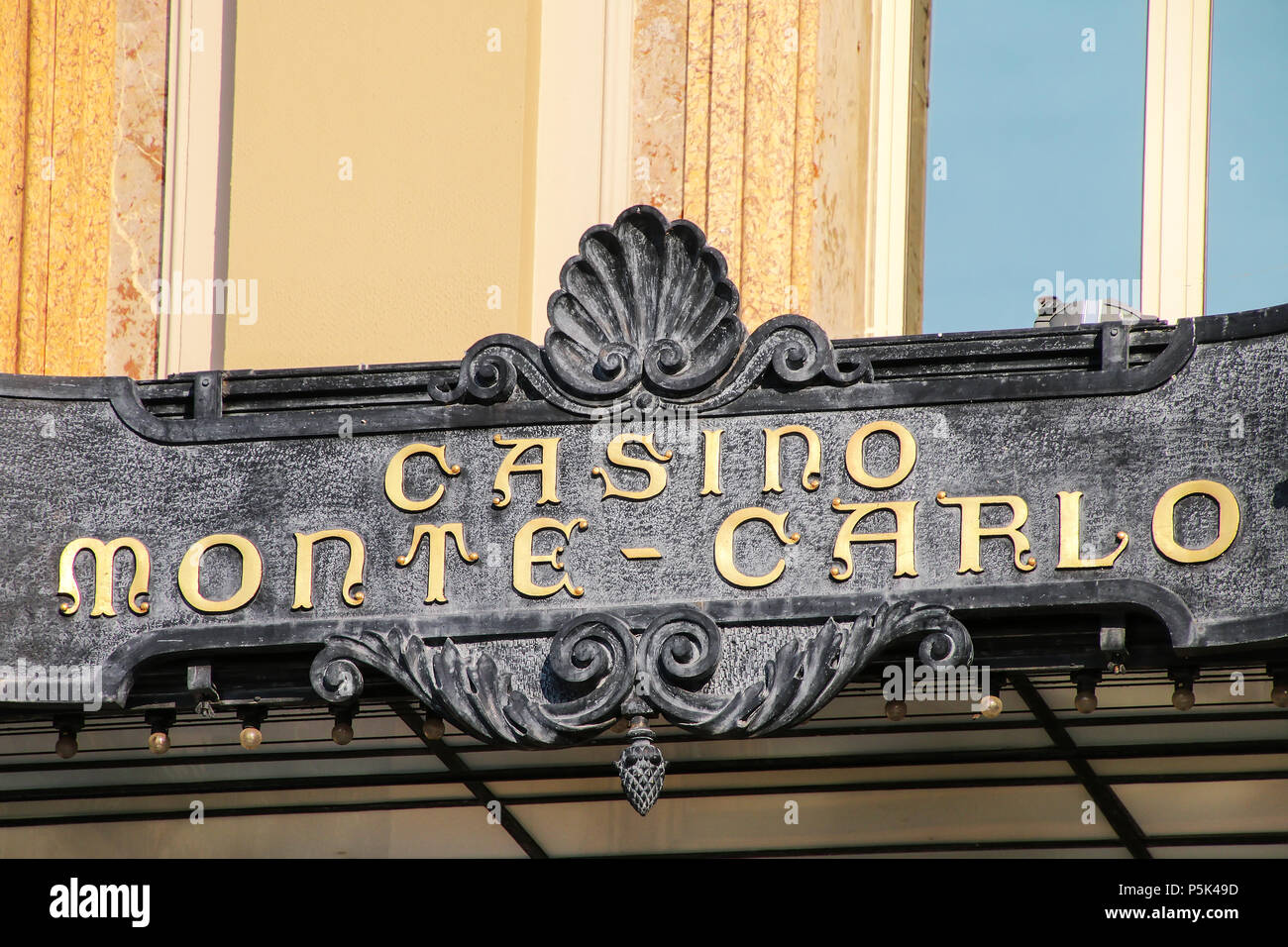 Sign at the main entrance of Monte Carlo Casino in Monaco. Monte Carlo Casino is a gambling and entertainment complex. Stock Photo