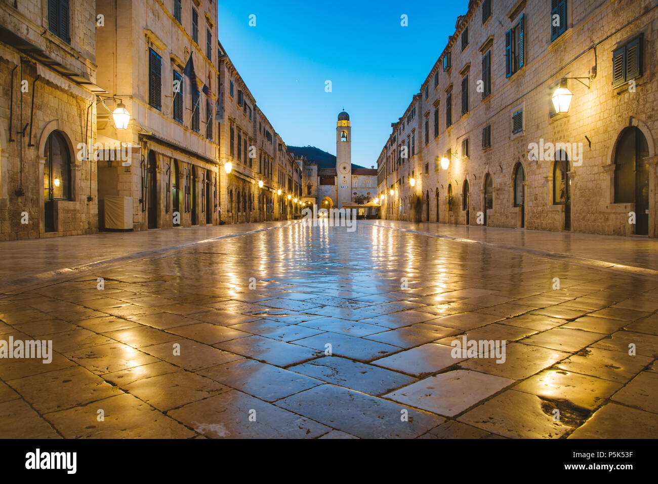 Classic panoramic view of famous Stradun, the main street of the old town of Dubrovnik, in beautiful morning twilight before sunrise at dawn in summer Stock Photo