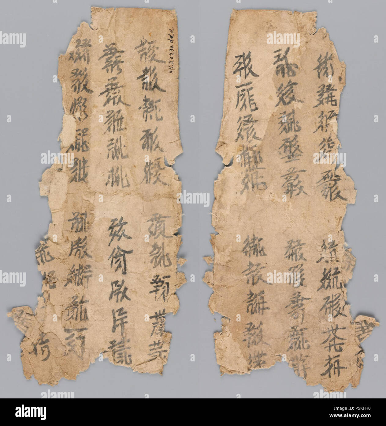 N/A. English: Both sides of a fragment of a manuscript copy of the Tangut thousand character poem, The Golden Guide (Chinese ), found at Kharakhoto by Aurel Stein during his expedition of 1913-1916; now held at the British Library Or.12380/2581. This fragment covers lines 160–165 and 166–171 of the 200 line poem. 12th century. Unknown 236 British Library Or 12380 2581 Stock Photo