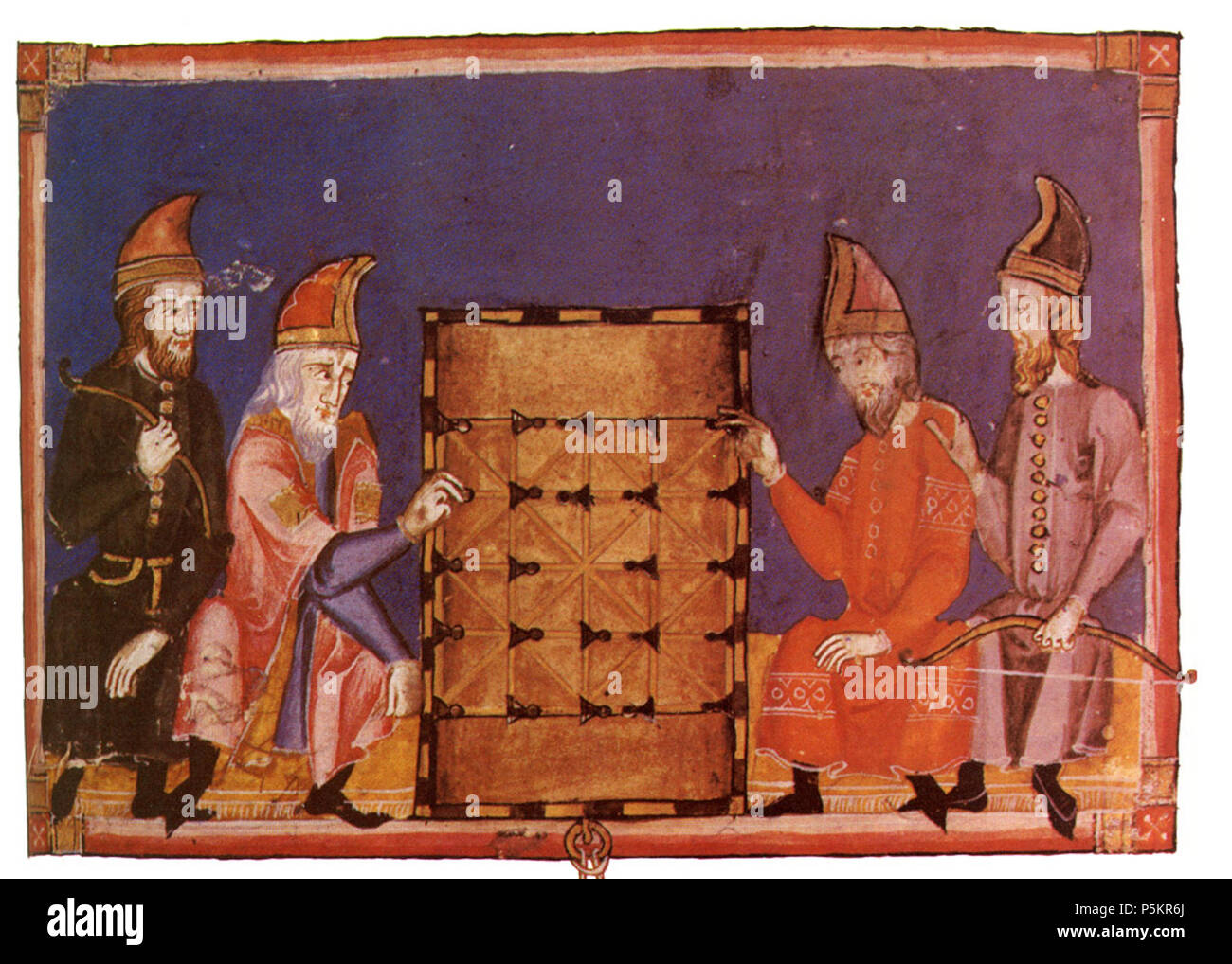 N/A. Men playing Alquerque, pictured in Libro de los juegos. 1283. Alfonso X of Castile 88 Alquerque in Libro de los juegos (uncropped) Stock Photo