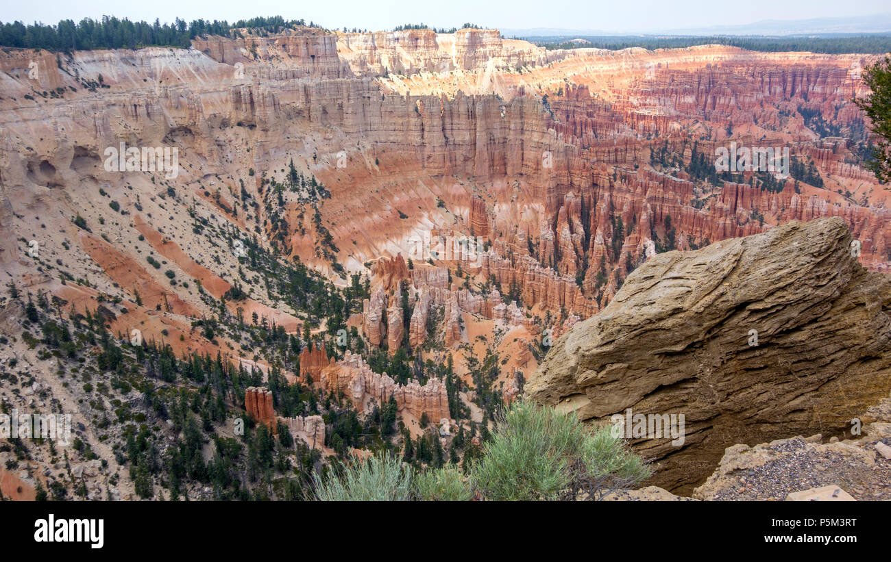 Amphitheatre at Bryce Canyon National Park showing colours of the sedimentary rocks formed by many years of erosion. Stock Photo