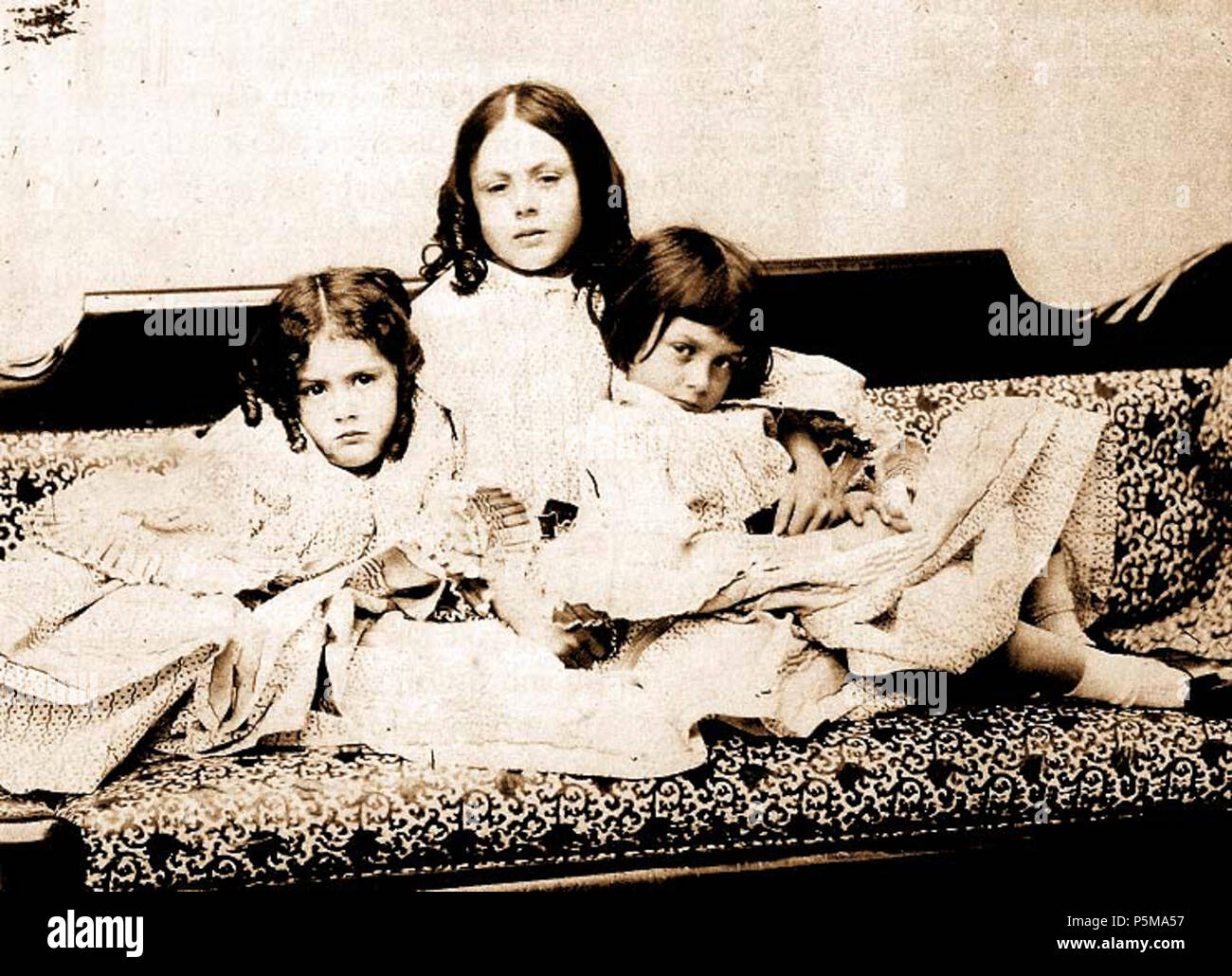 N/A. English: Edith, Lorina & Alice Liddell: This was first published in Carroll's biography by his nephew: Collingwood, Stuart Dodgson (1898) The Life and Letters of Lewis Carroll, London: T. Fisher Unwin, pp. p. 94 Retrieved on 22 December 2010. . 1859.   Lewis Carroll  (1832–1898)       Alternative names Charles Lutwidge Dodgson  Description British-English writer, mathematician and photographer  Date of birth/death 27 January 1832 14 January 1898  Location of birth/death Daresbury, Cheshire, England Guildford, Surrey, England  Work period 1854 to 1898  Work location England  Authority cont Stock Photo