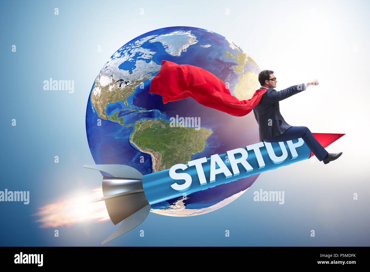 Superhero businessman in start-up concept flying rocket Stock Photo - Alamy