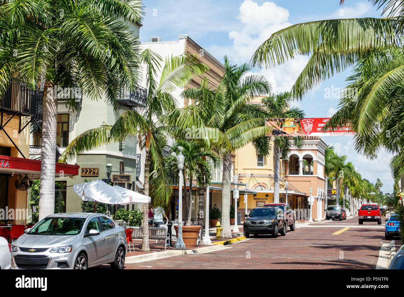 Florida Fort Ft. Myers River District 1st First Street businesses downtown,shopping shops marketplace stores business district palm trees, Stock Photo