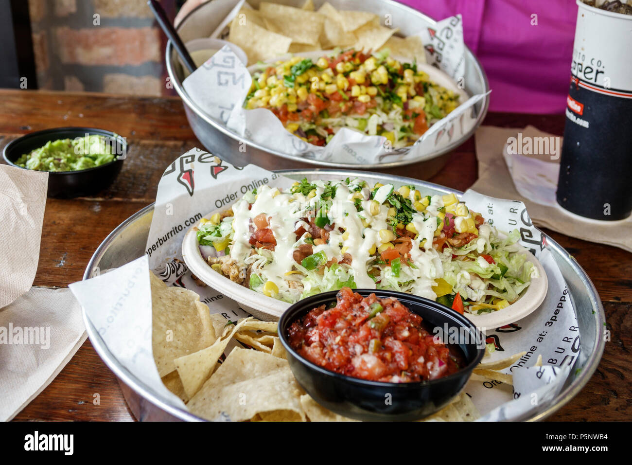 Fort Ft. Myers Florida,1st First Street,3 Pepper Burrito Co Company,restaurant restaurants food dining cafe cafes,Mexican,lunch,plate,salad bowl,salsa Stock Photo