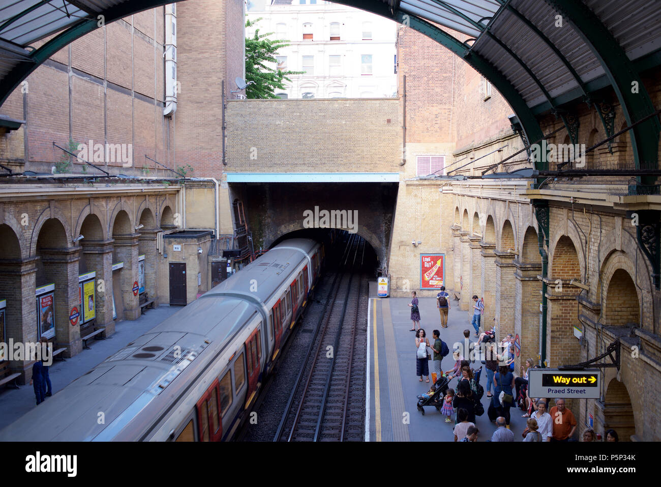 District Line train at Paddington Underground station in London Stock