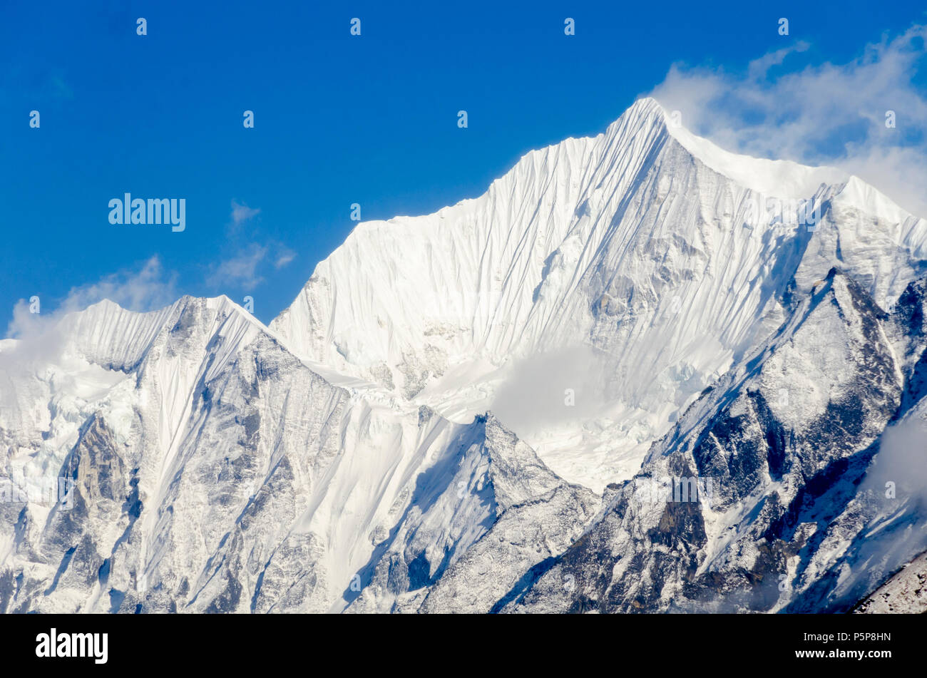 Snow covered mountain peak, Langtang Village, Langtang Valley, Nepal ...