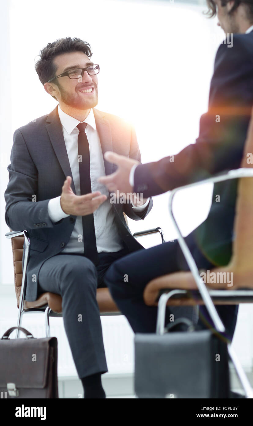Two businessmen holding briefcases near themselves Stock Photo Alamy