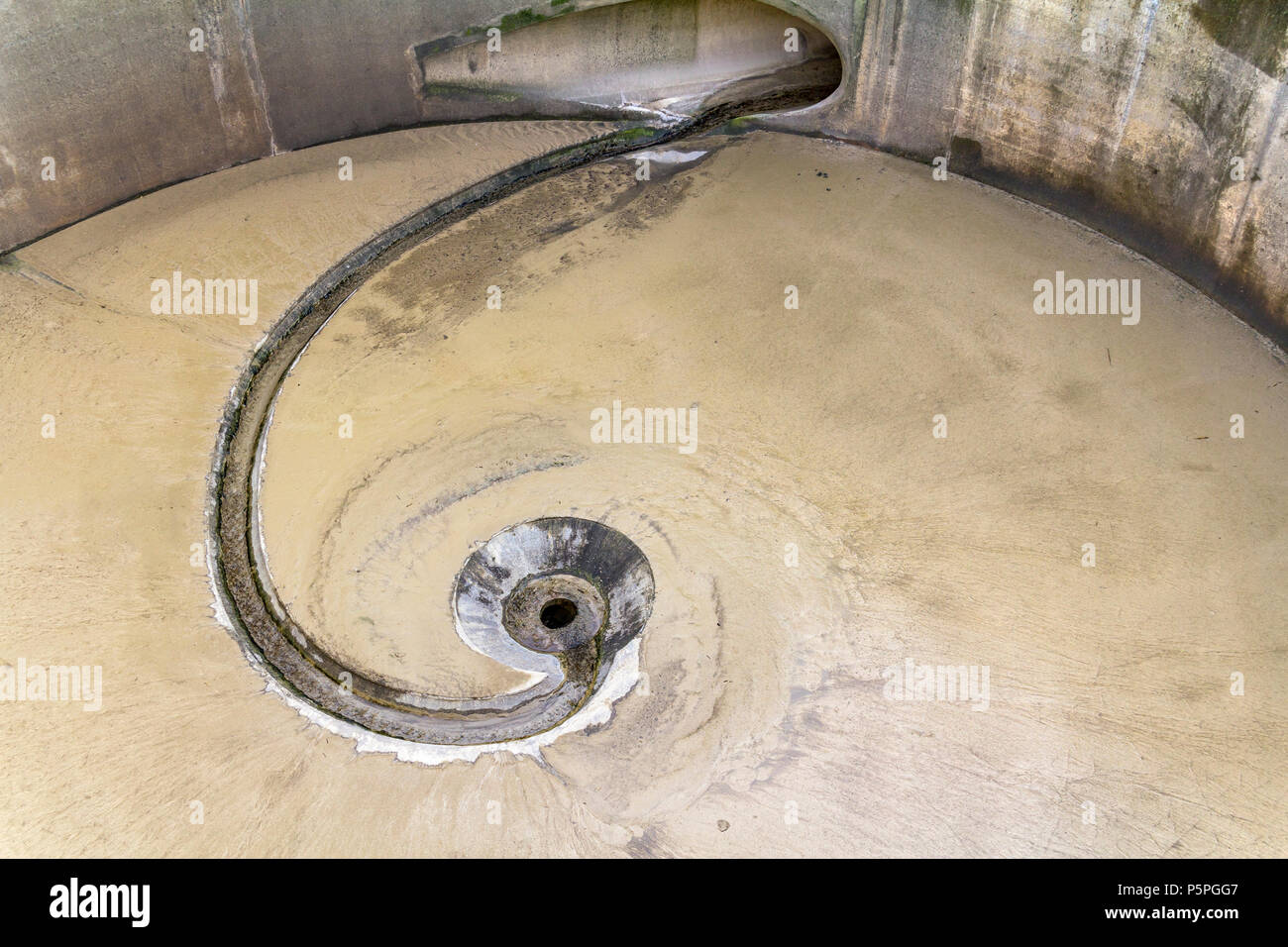 nearly abstract full frame detail showing the ground of a sedimentation tank Stock Photo