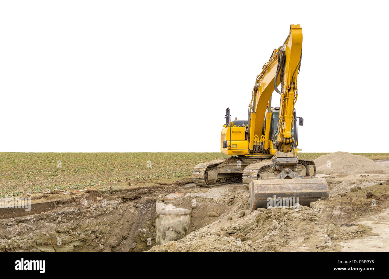 excavator at a loamy construction site Stock Photo - Alamy