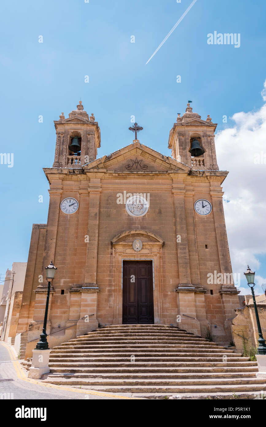 Ghajnsielem old parish church, Gozo, Malta, with two clocks, one set