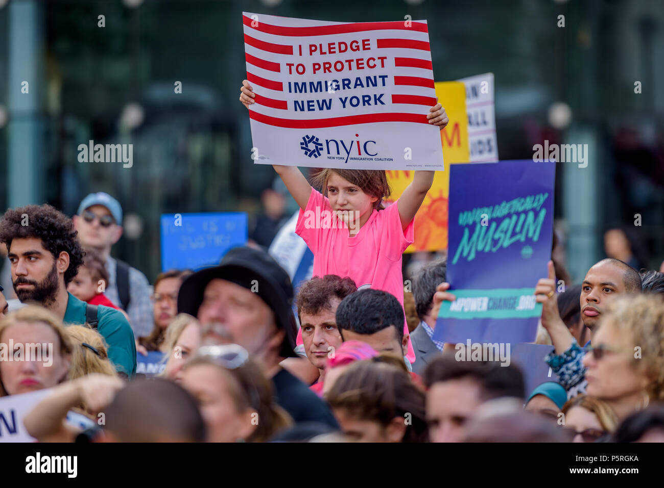 New York, United States. 26th June, 2018. Over a thousand New Yorkers and immigration rights community organizations gathered at Foley Square in lower Manhattan on June 26, 2018, to rally against the Supreme Court decision announced this morning to uphold the Muslim Ban. The Asian American Federation is calling on its member agencies, advocates and community leaders, allies, and elected officials to stand together in solidarity. Credit: Erik McGregor/Pacific Press/Alamy Live News Stock Photo