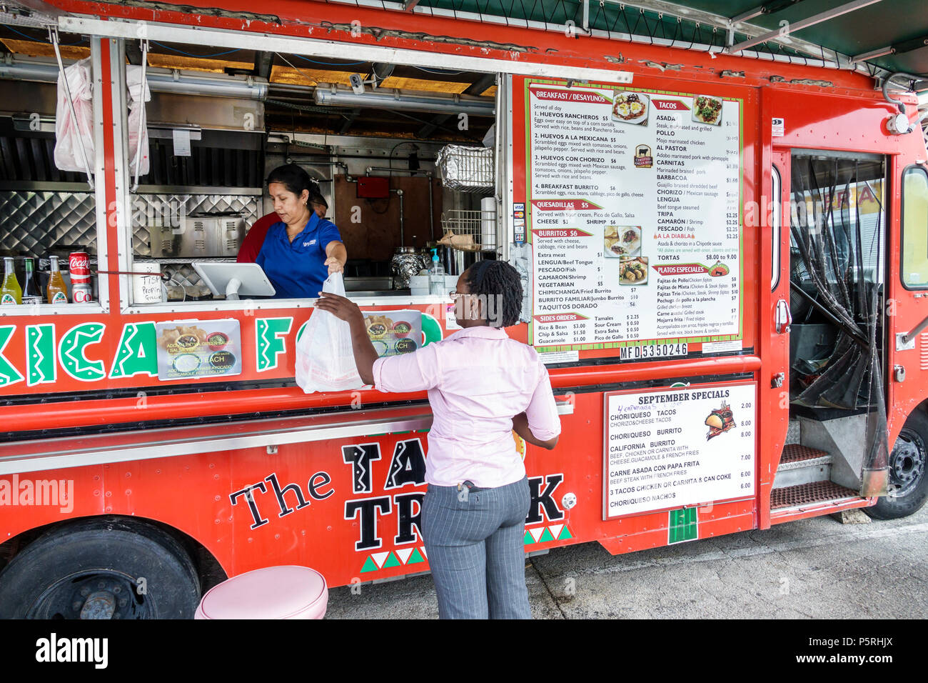 Stuart Florida,The Taco Truck Mexican Food,food truck,pop-up restaurant,street food industry cuisine,Black African Africans,Hispanic woman female wome Stock Photo