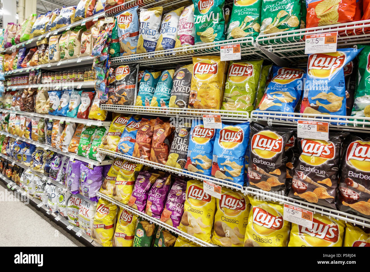 Stuart Florida,Publix grocery store supermarket food,interior inside,shelf shelves shelving,snacks,potato chips,Lay's,brand,shelves display sale,visit Stock Photo