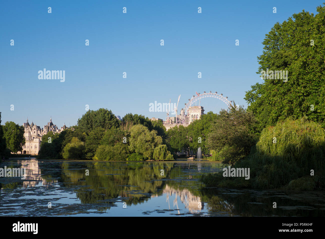 Summer scene overlooking St James's Park Lake with the London Eye in distance Stock Photo