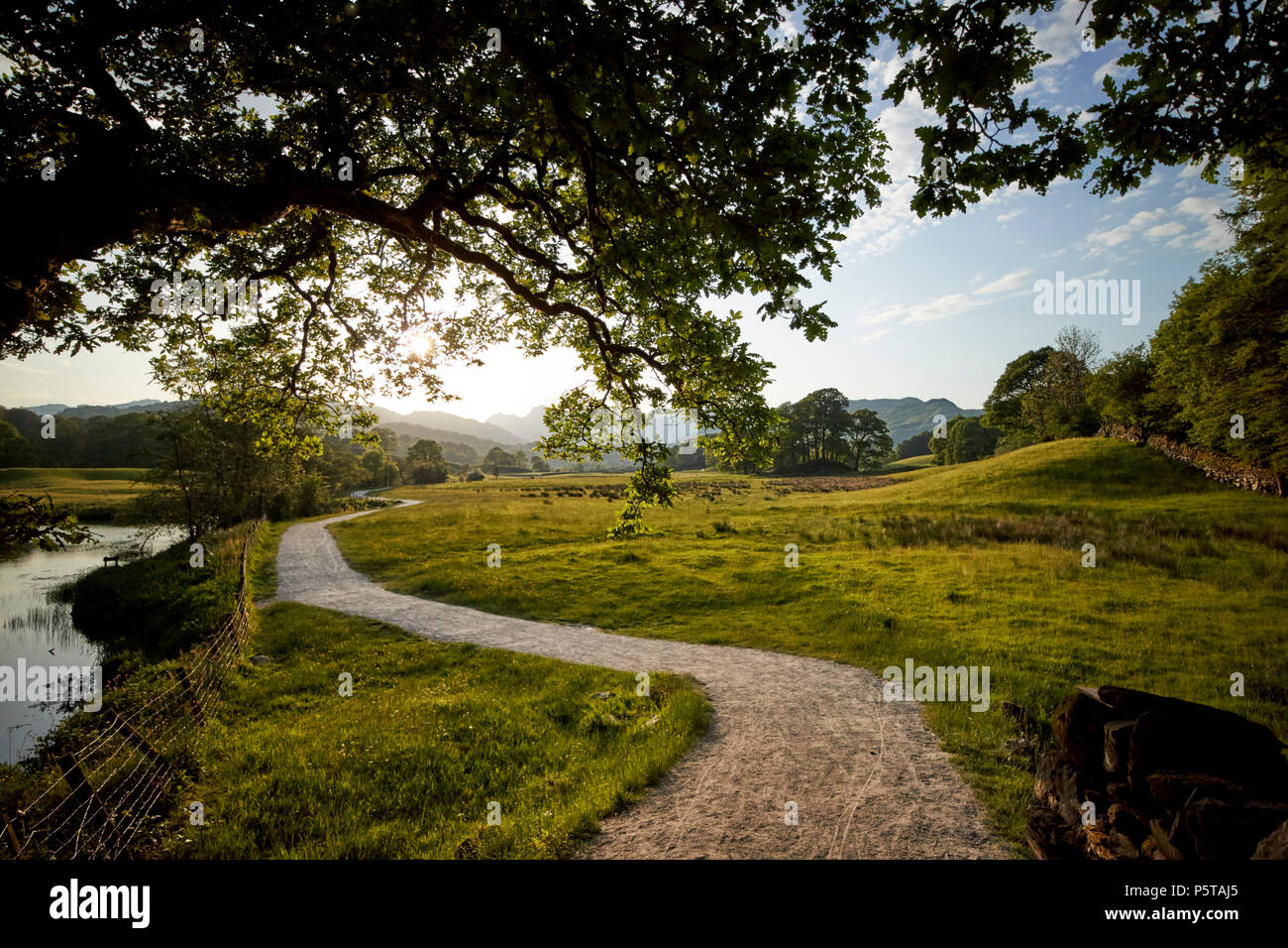 farmland and right of way winding path near skelwith in the lake