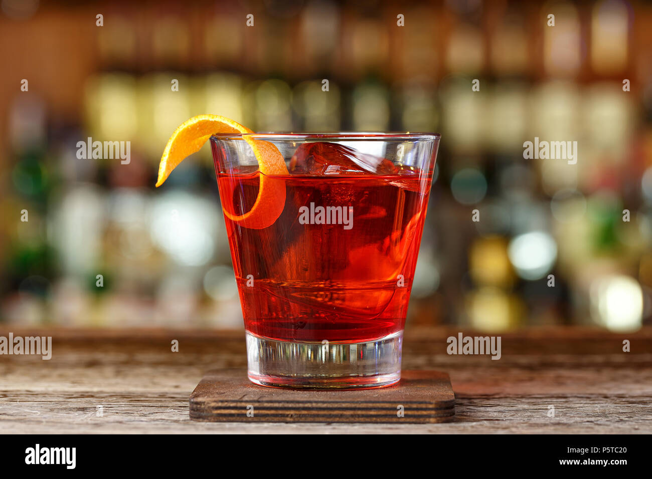Classic cocktail Negroni with gin, campari and martini rosso