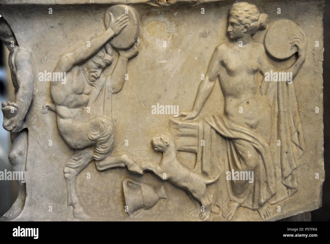 Roman sarcophagus. About 140 AD. Marriage of Dionysus and Adriadne. Detail. Lateral wall. Courtship: maenad, satyr and panther. Glyptothek. Munich. Germany. Stock Photo