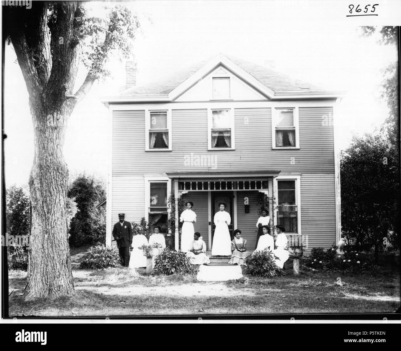 N/A. English: Persistent URL: digital.lib.muohio.edu/u/snyder,3796 Subject (TGM): Afro-Americans; Families; Family; Houses; Group portraits;  . 30 July 1908. Snyder, Frank R. Flickr: Miami U. Libraries - Digital Collections 329 Charles Smoot family in front of house 1908 (3196829950) Stock Photo