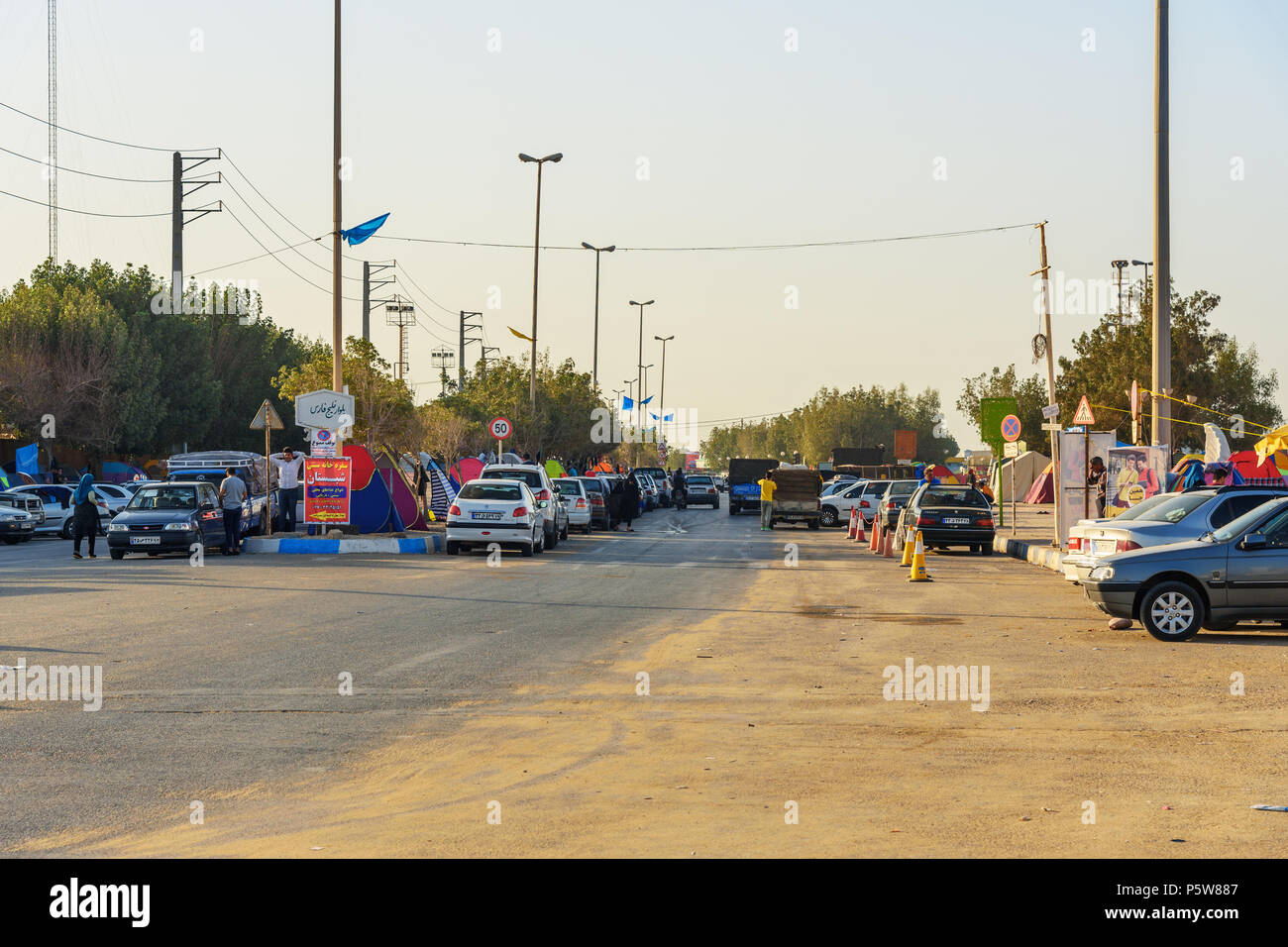 Bandar Ganaveh, Bushehr Province, Iran - March 27, 2018: Iranian travelers living in tents on the beach at Persian Gulf. A lot of Iranians traveling d Stock Photo