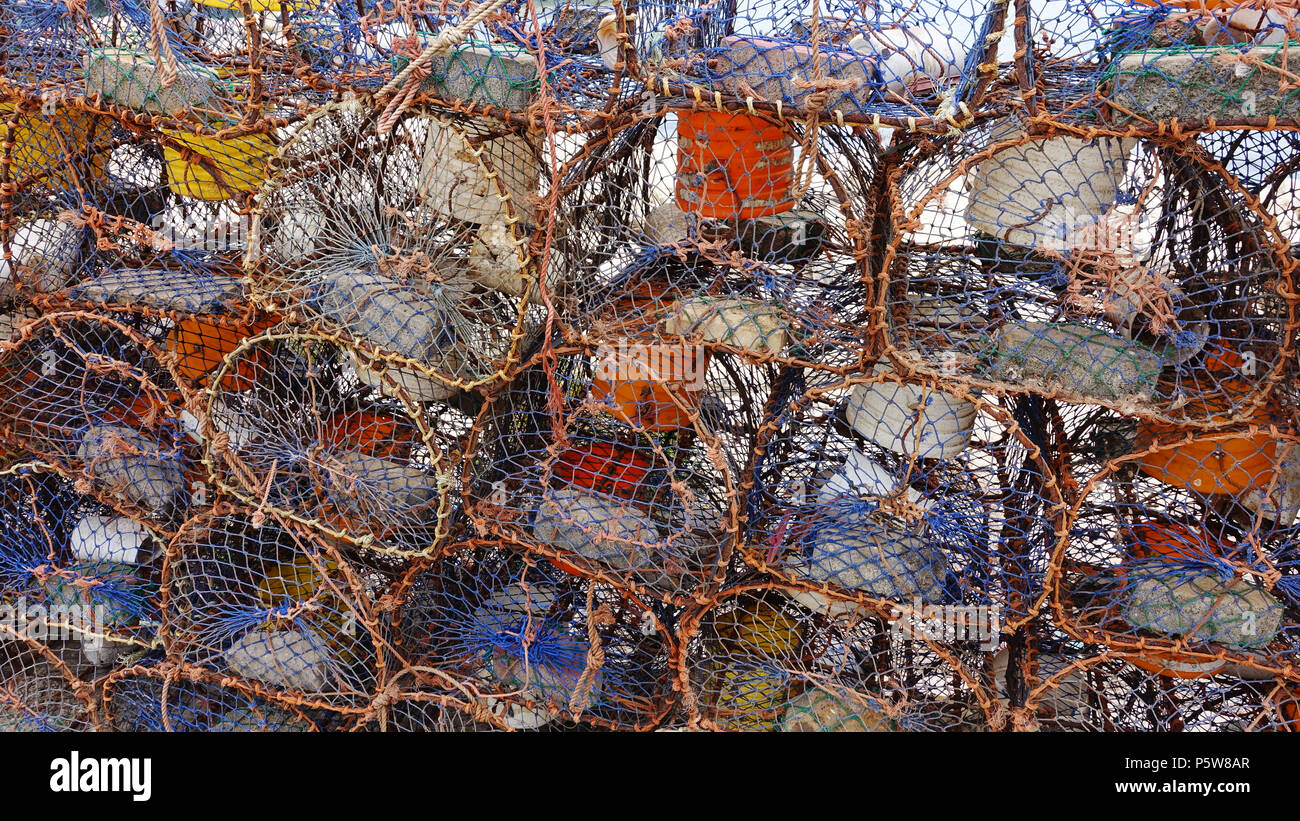 Lobster pots waiting to be loaded onto fishing boats. Essaouira, Morocco. Stock Photo