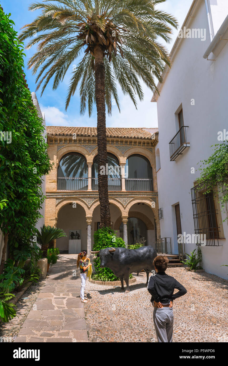 Cordoba Bullfighting Museum, view of two young people visiting the Museo Taurino - the Bullfighting Museum in Cordoba (Cordova), Andalucia, Spain. Stock Photo