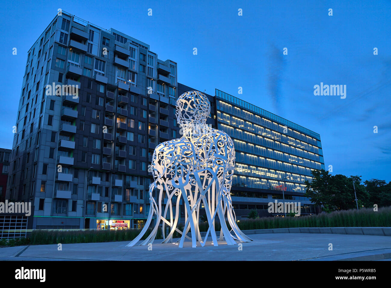 Five Roses Building Montreal,Canada, 26 June 2018. Public art scupture The Source by artist ...